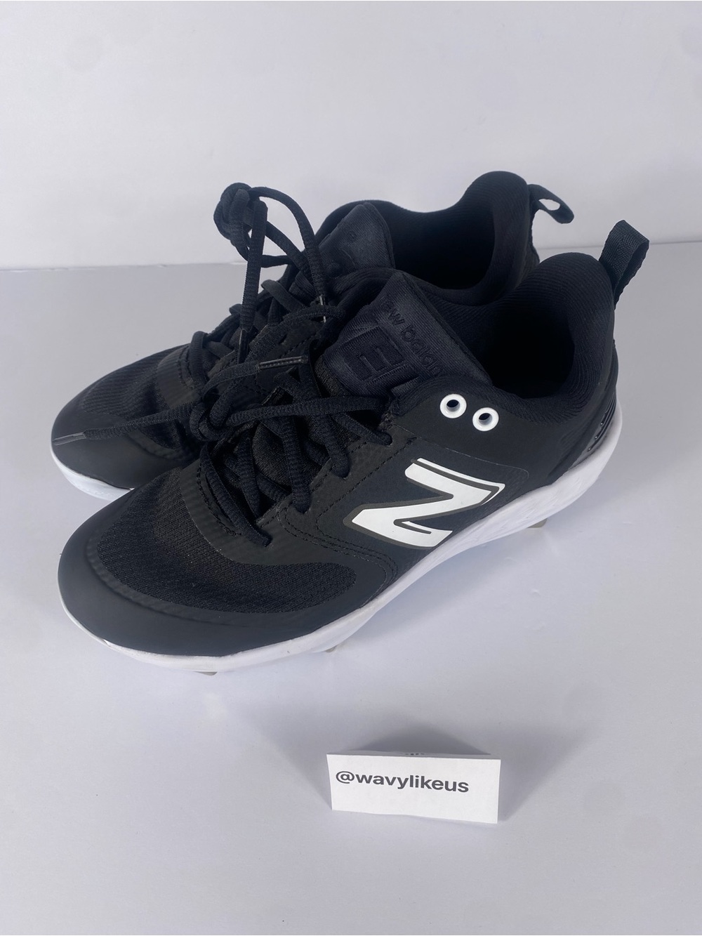 New Balance Kids Black and White Lace-Up Sneakers